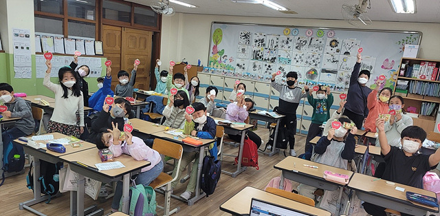 사진1(송원초, 애플데이주간 운영).jpg